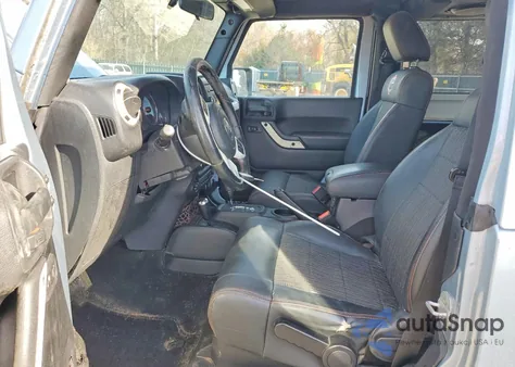 2012 Jeep Wrangler Sahara z USA, uszkodzony, nr VIN 1C4AJWBG9CL148469